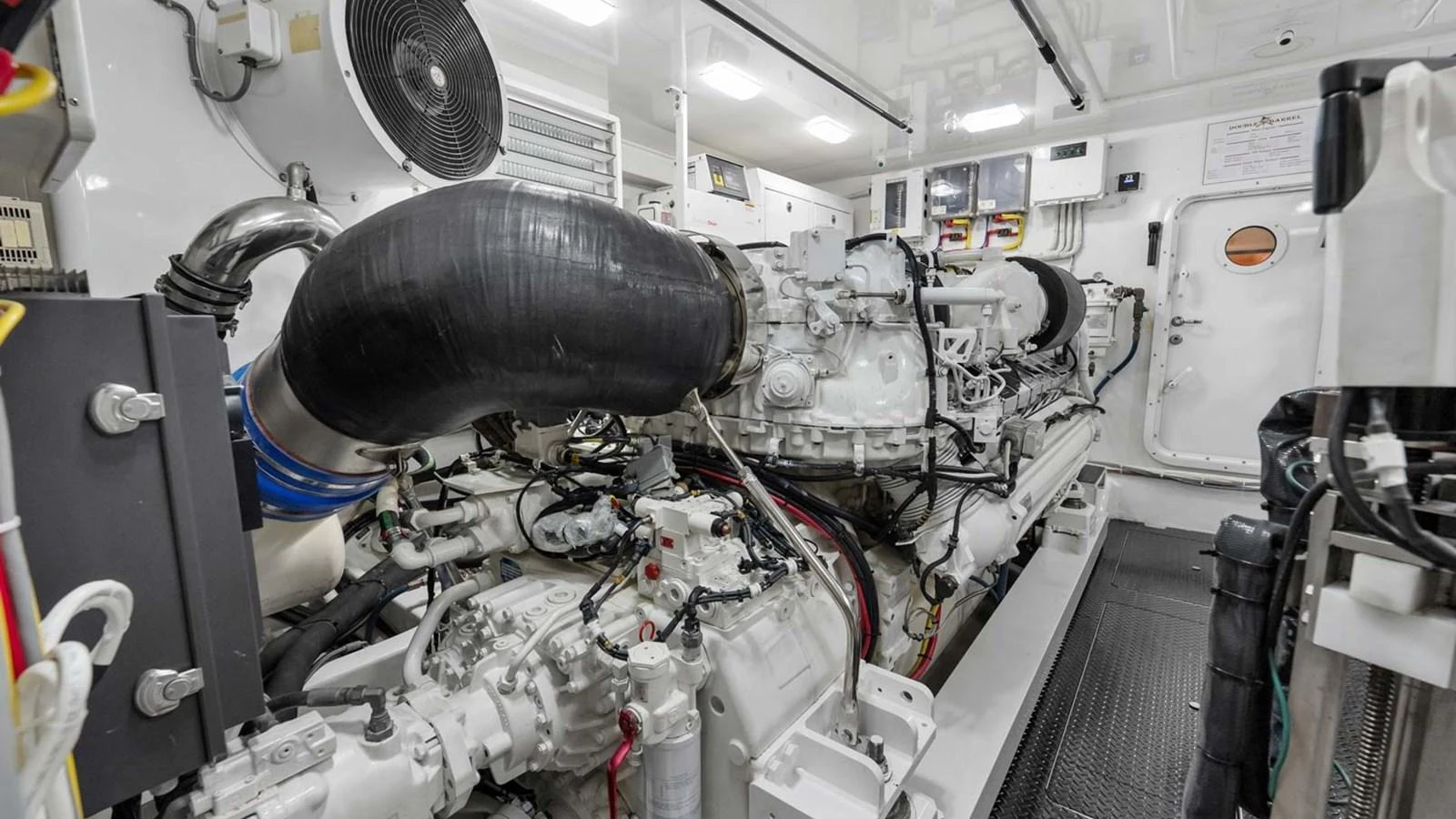 The image showcases the well-maintained engine room of the yacht, highlighting its powerful machinery and clean setup. aboard DOUBLE BARREL Yacht for Sale