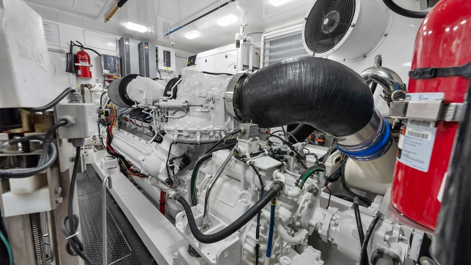 The yacht's engine room showcases a powerful and meticulously maintained engine setup. aboard DOUBLE BARREL Yacht for Sale