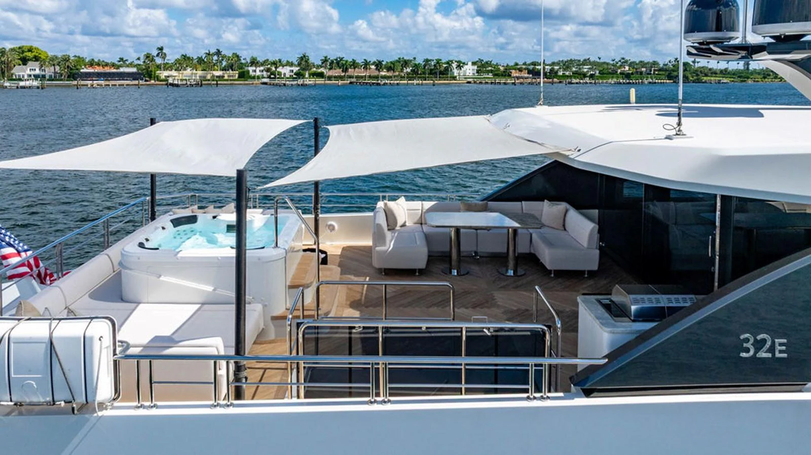 The flybridge features a luxurious seating area and a jacuzzi, perfect for relaxation and entertainment. aboard M/Y 12 Yacht for Sale
