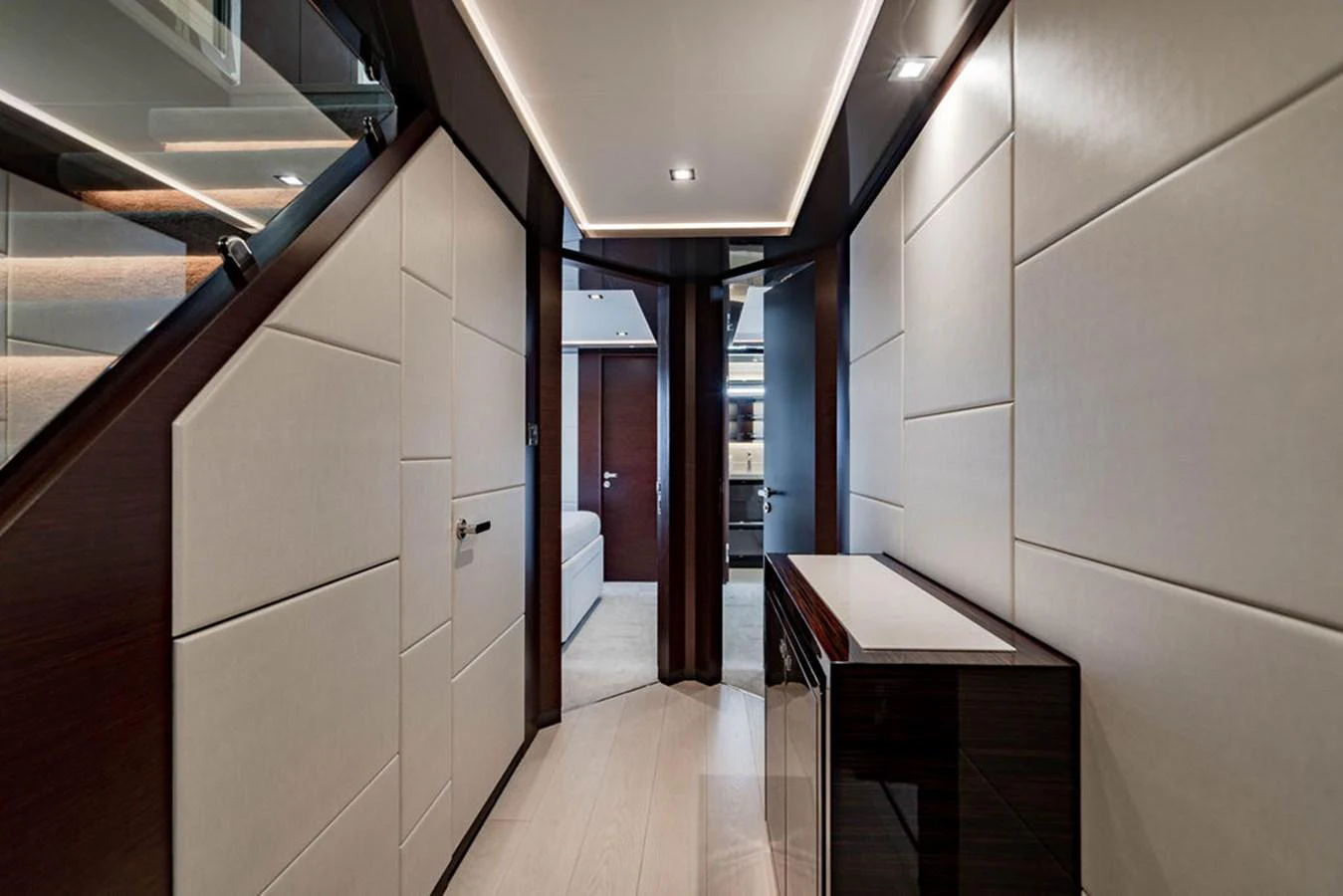 A sleek and modern hallway with luxurious finishes and ambient lighting. aboard M/Y 12 Yacht for Sale