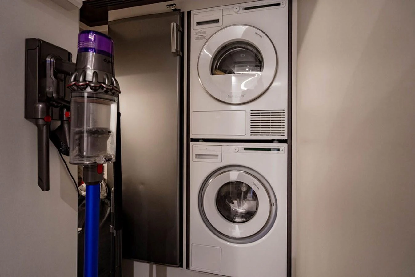 The yacht features a convenient laundry area with modern appliances. aboard M/Y 12 Yacht for Sale