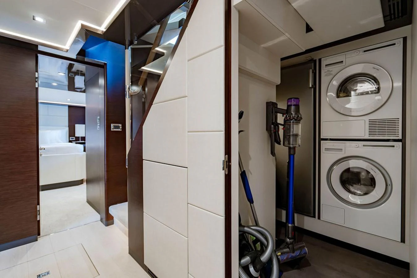 The yacht's interior features a well-equipped laundry area with modern appliances. aboard M/Y 12 Yacht for Sale