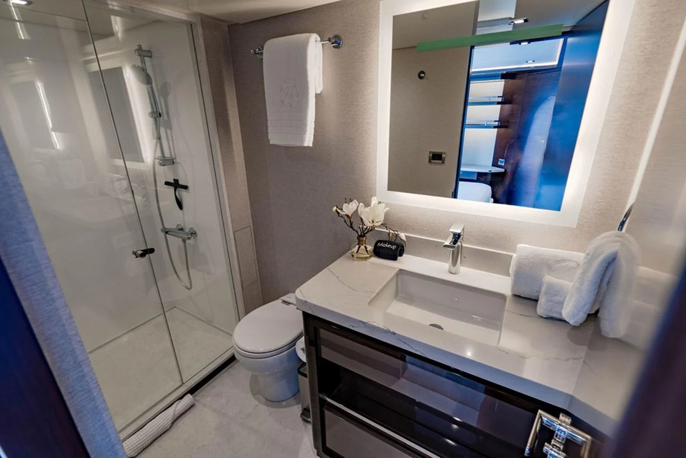 The yacht's bathroom features modern fixtures and a sleek design. aboard M/Y 12 Yacht for Sale