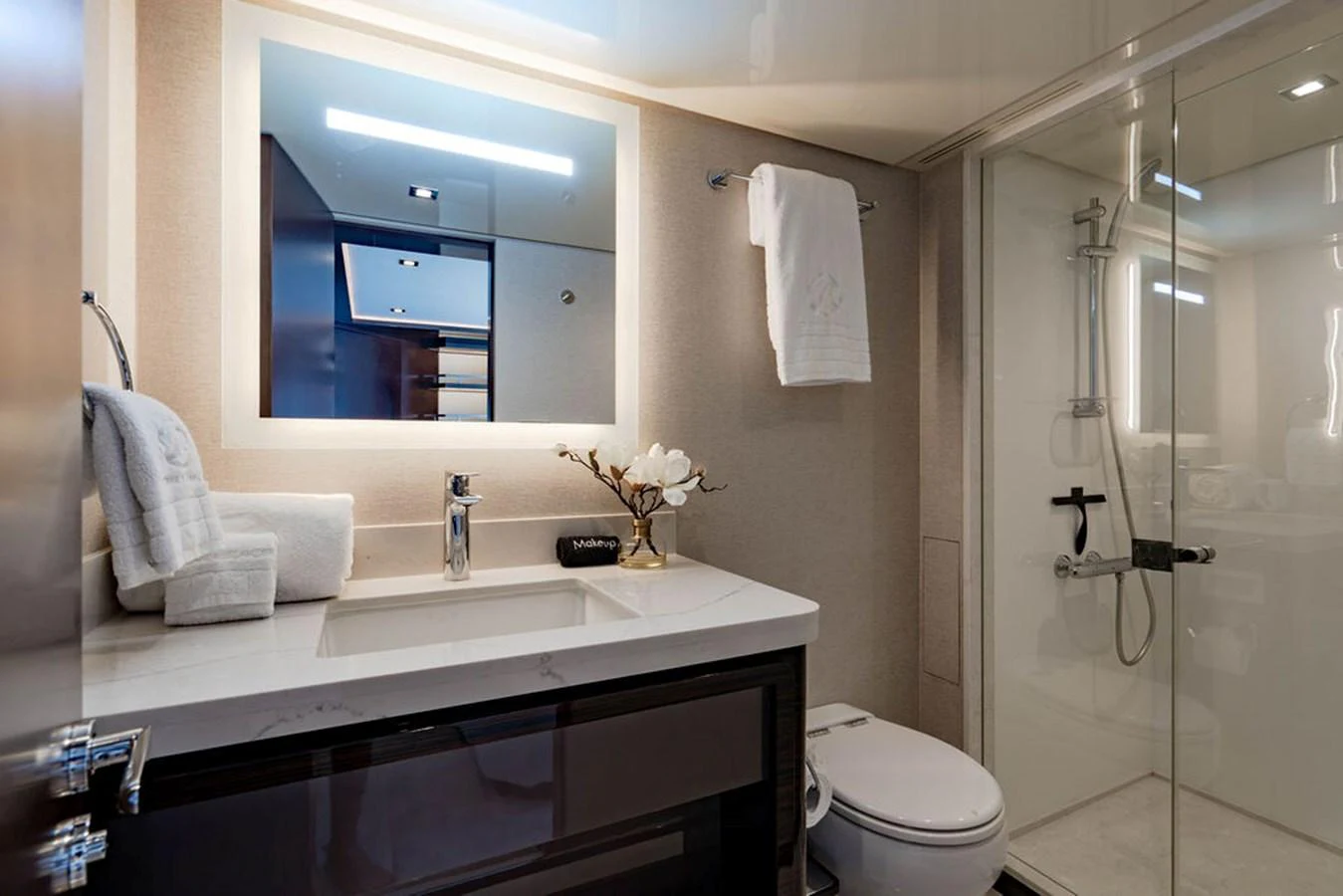 The yacht's bathroom features modern fixtures and a spacious shower area. aboard M/Y 12 Yacht for Sale