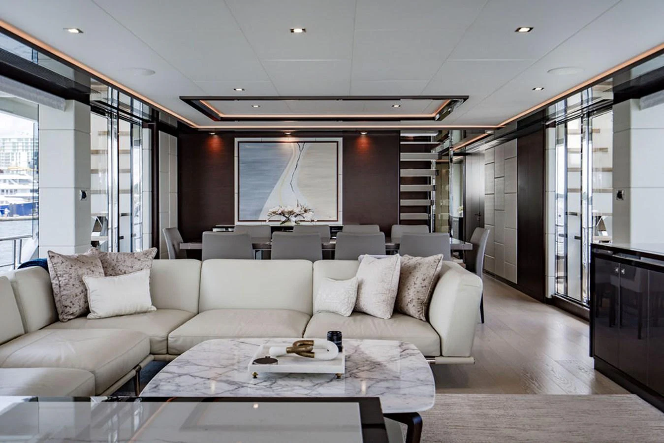 The salon features elegant furnishings and a sophisticated ambiance, perfect for relaxation and socializing. aboard M/Y 12 Yacht for Sale