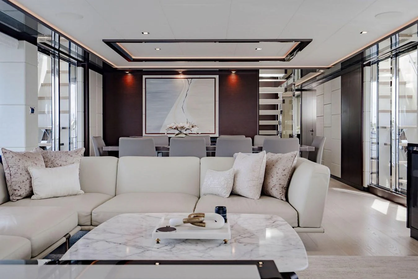 The salon features a luxurious seating area with a modern, elegant design. aboard M/Y 12 Yacht for Sale