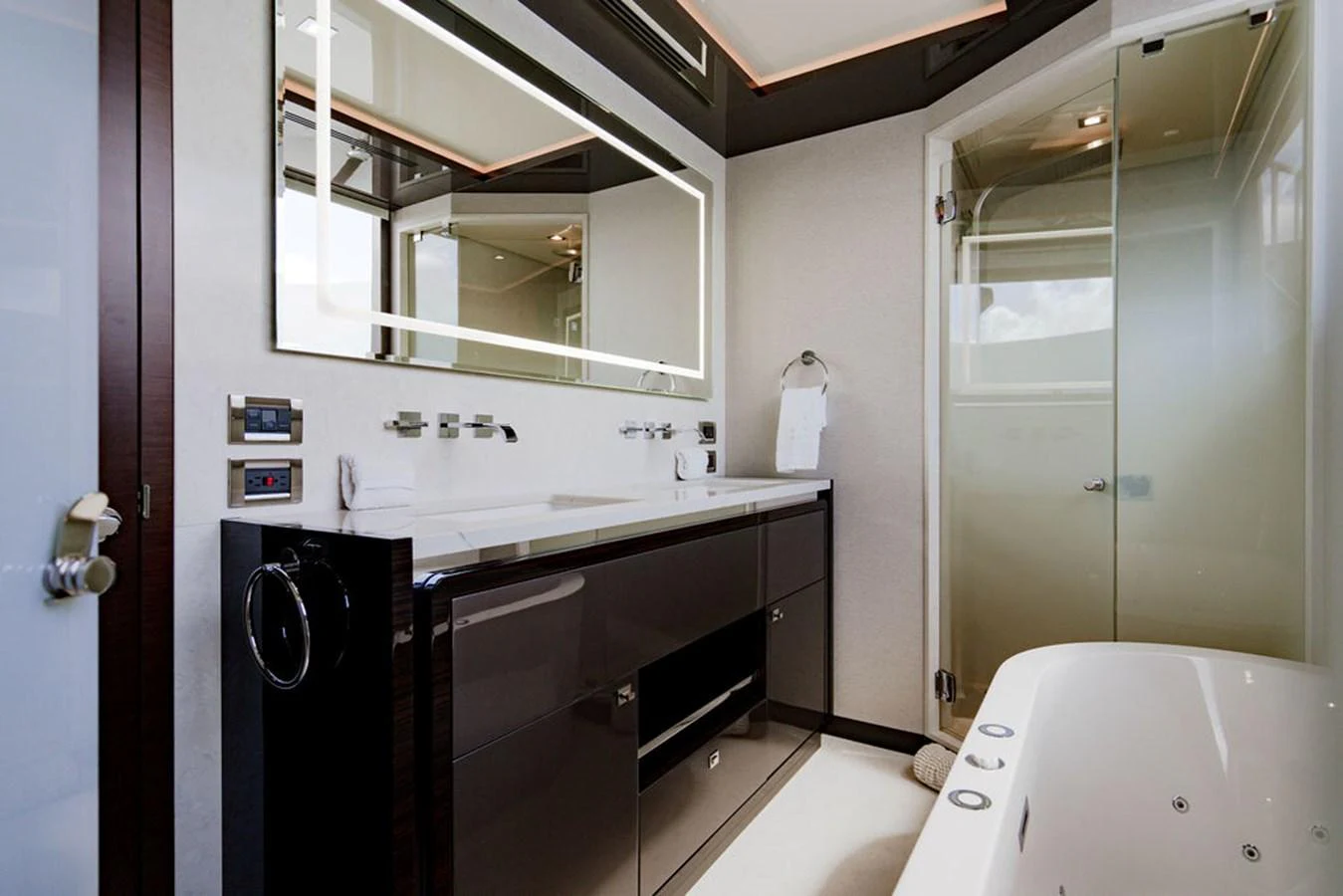 The yacht's bathroom features modern fixtures and a sleek design. aboard M/Y 12 Yacht for Sale