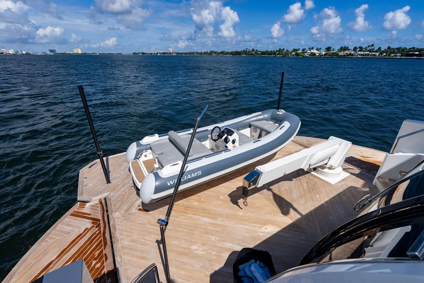 A sleek tender is securely positioned on the yacht's aft deck, ready for excursions. aboard M/Y 12 Yacht for Sale