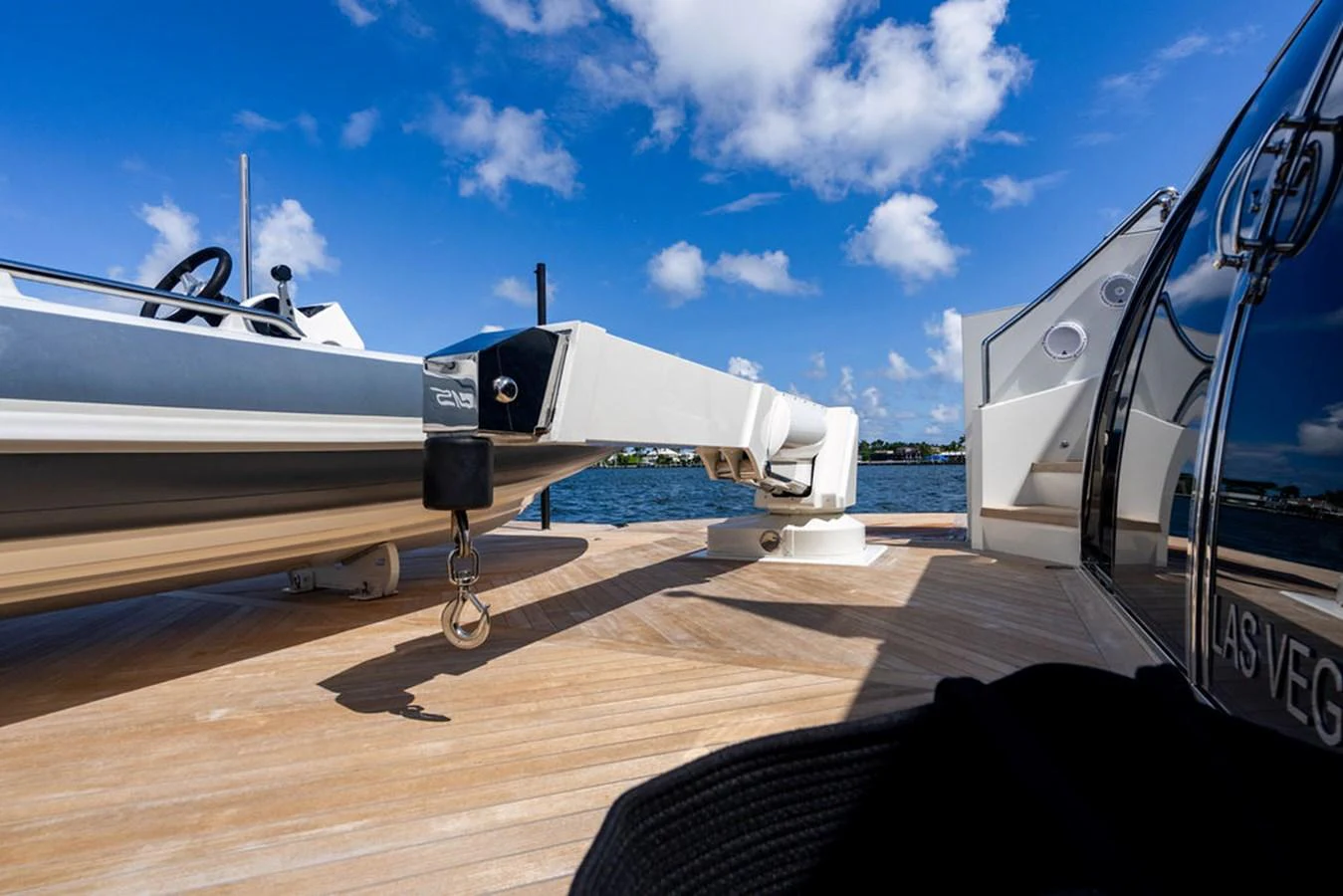 A sleek tender is securely mounted on the yacht's deck, ready for deployment. aboard M/Y 12 Yacht for Sale