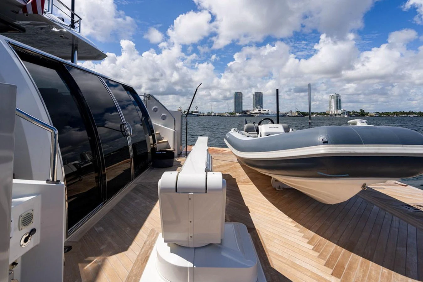 A sleek tender is positioned on the aft deck of the yacht, ready for excursions. aboard M/Y 12 Yacht for Sale