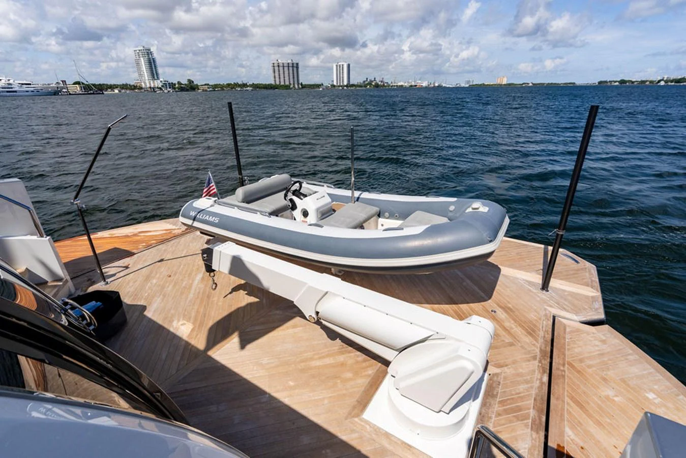 A sleek tender is securely positioned on the aft deck, ready for excursions. aboard M/Y 12 Yacht for Sale