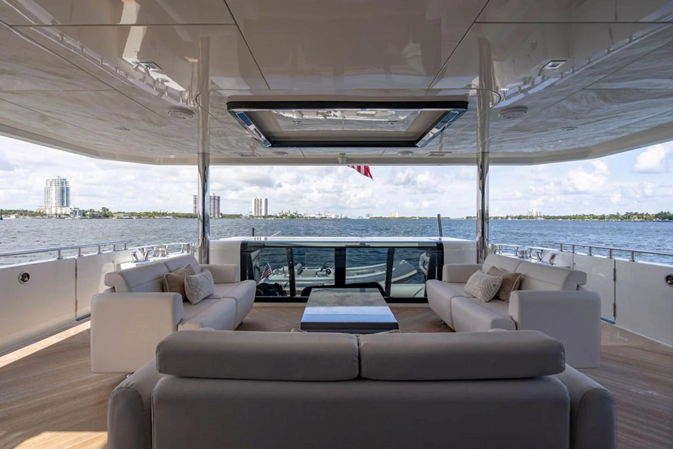 The aft deck offers a luxurious seating area with panoramic views of the surrounding waters. aboard M/Y 12 Yacht for Sale