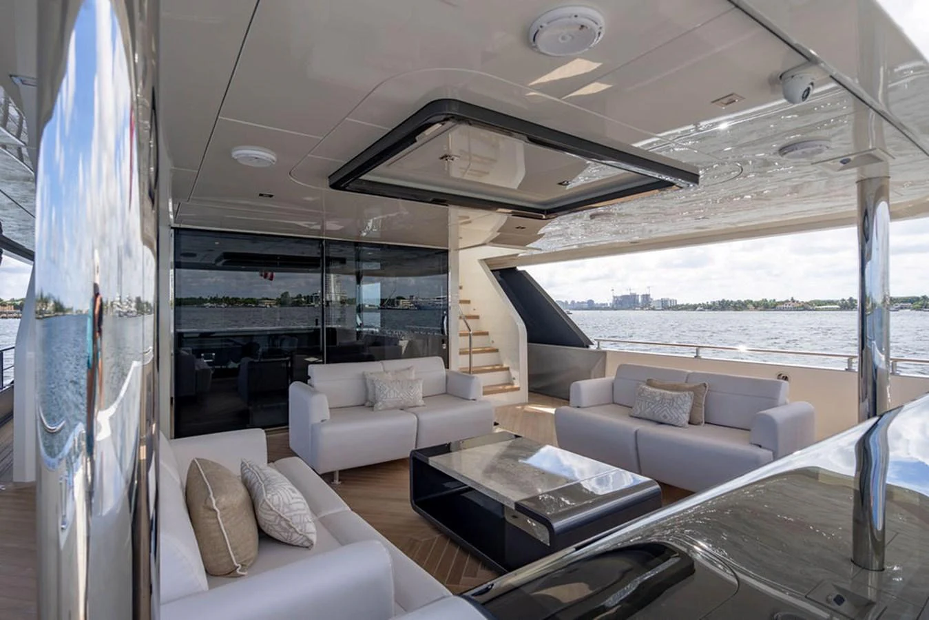 The salon offers a spacious and luxurious seating area with panoramic views of the water. aboard M/Y 12 Yacht for Sale