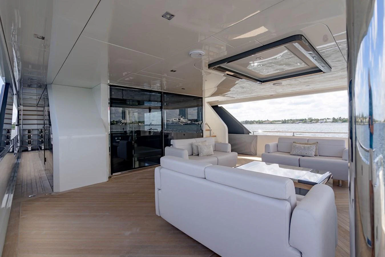 The aft deck features plush seating with a serene view of the water. aboard M/Y 12 Yacht for Sale