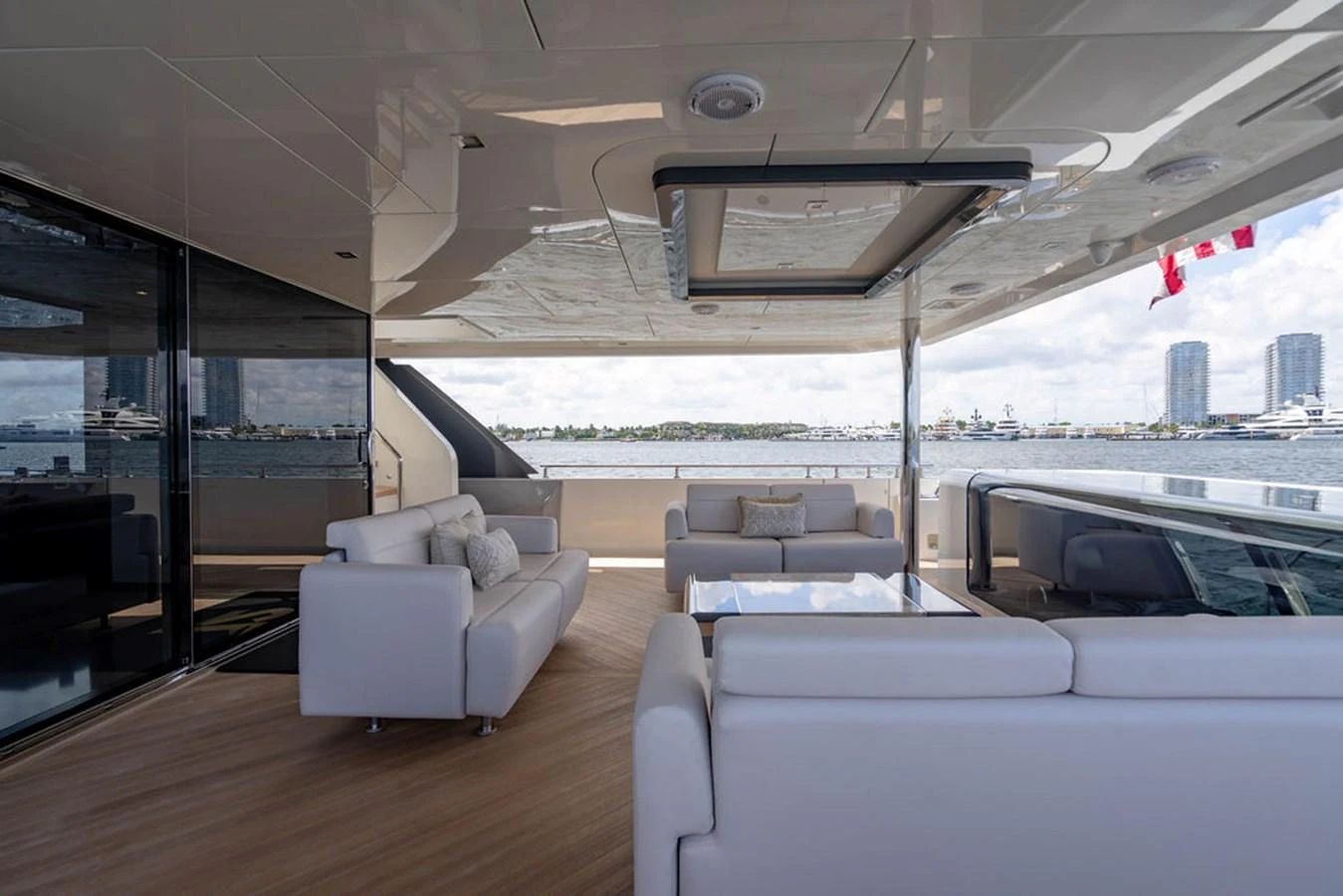 The aft deck offers a luxurious and spacious seating area with a stunning view of the water. aboard M/Y 12 Yacht for Sale