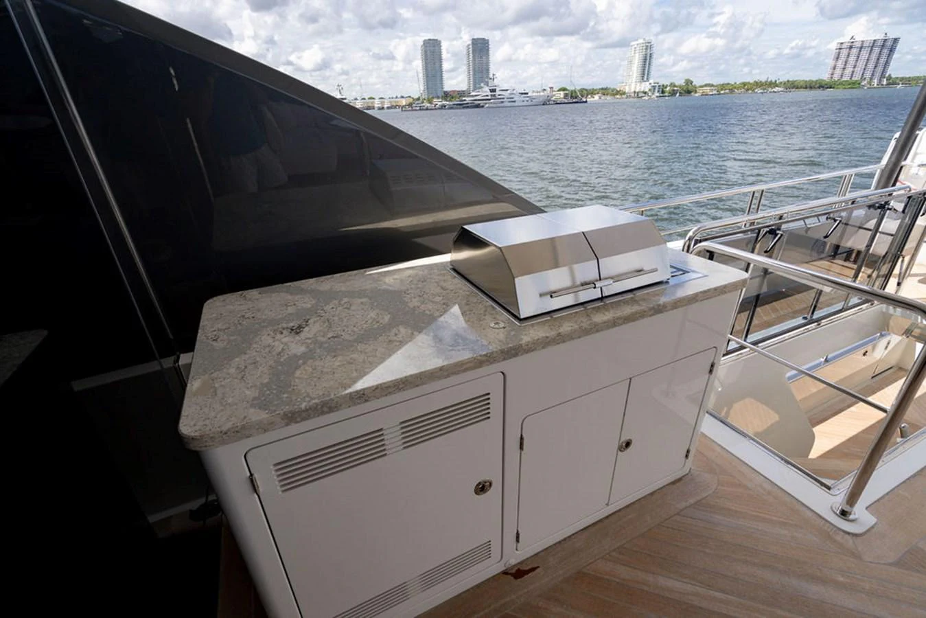 The yacht features an outdoor galley with a built-in grill, perfect for alfresco dining. aboard M/Y 12 Yacht for Sale