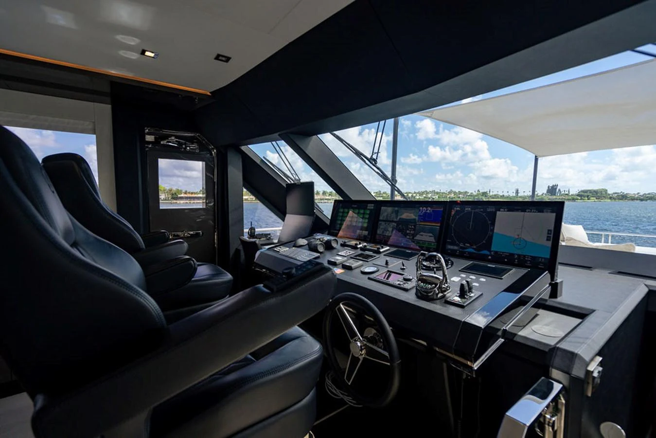 The helm station offers a sophisticated and technologically advanced command center with panoramic views. aboard M/Y 12 Yacht for Sale