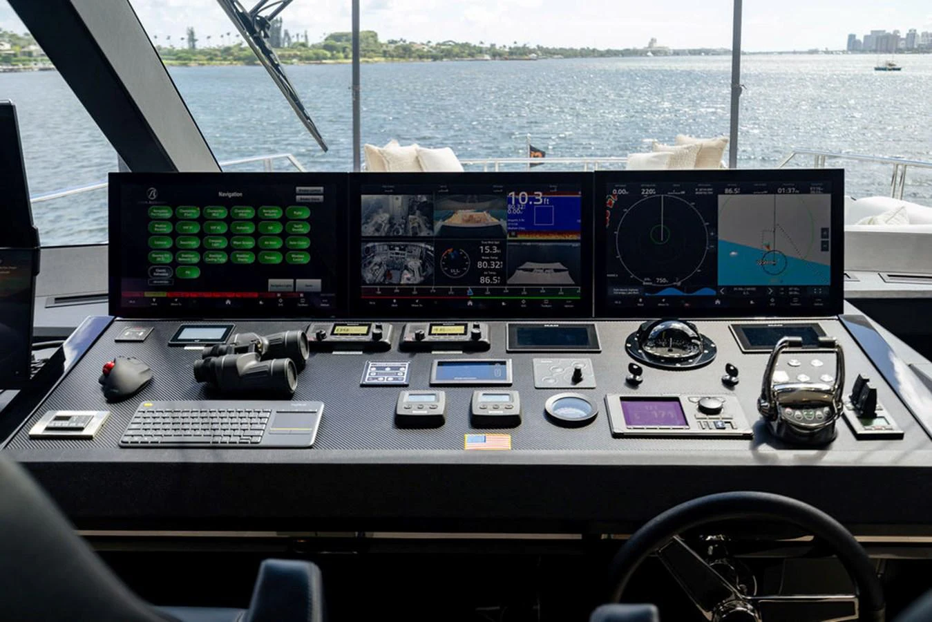 The helm station is equipped with advanced navigation and control systems, offering a commanding view of the water. aboard M/Y 12 Yacht for Sale