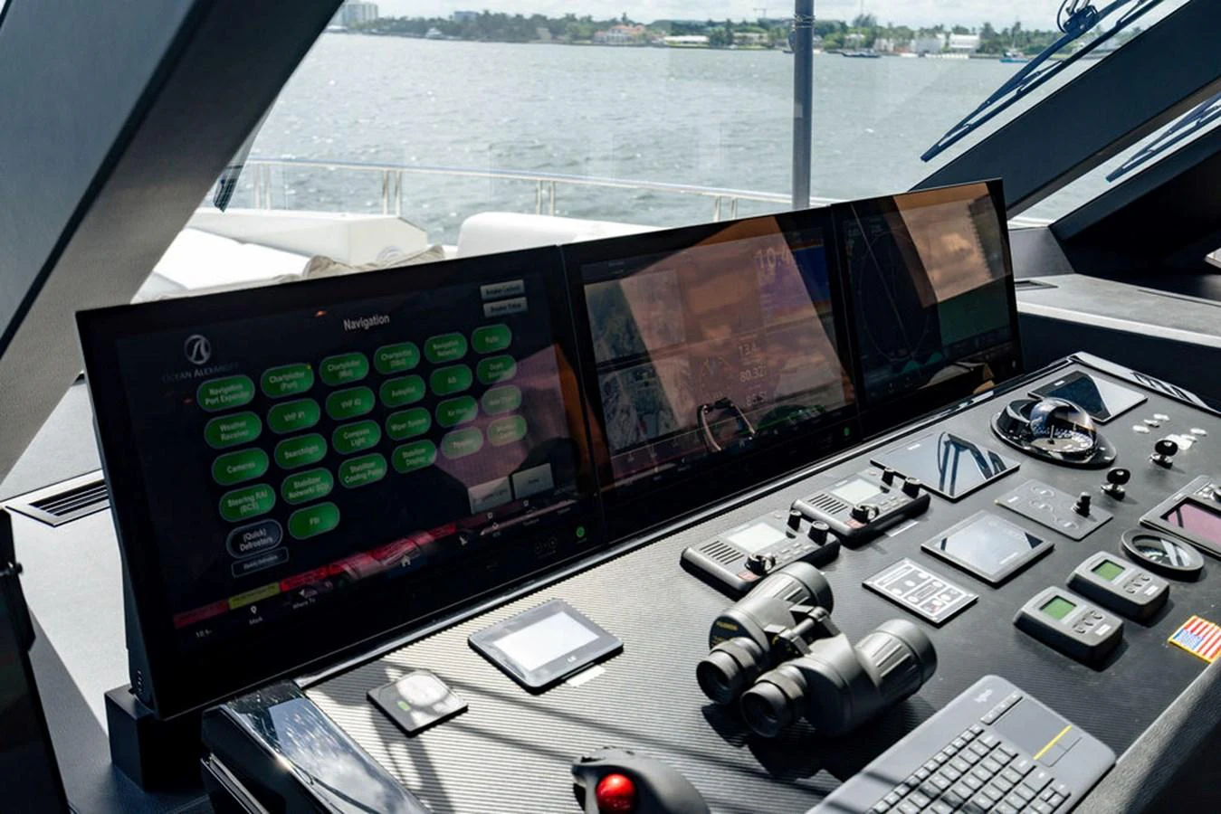 The helm station features advanced navigation equipment and a panoramic view of the water. aboard M/Y 12 Yacht for Sale