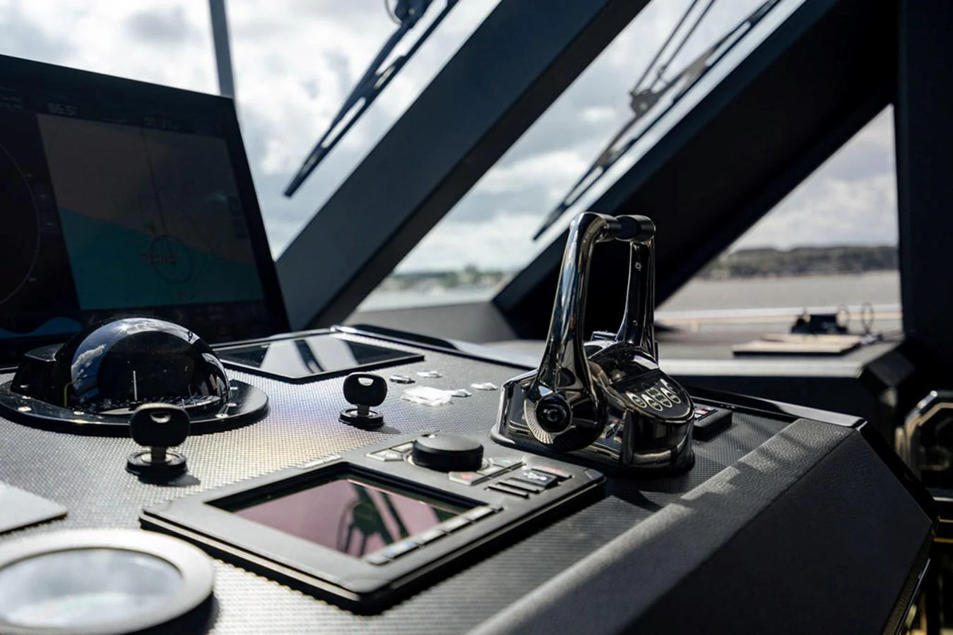 The helm station features advanced navigation equipment and sleek controls. aboard M/Y 12 Yacht for Sale