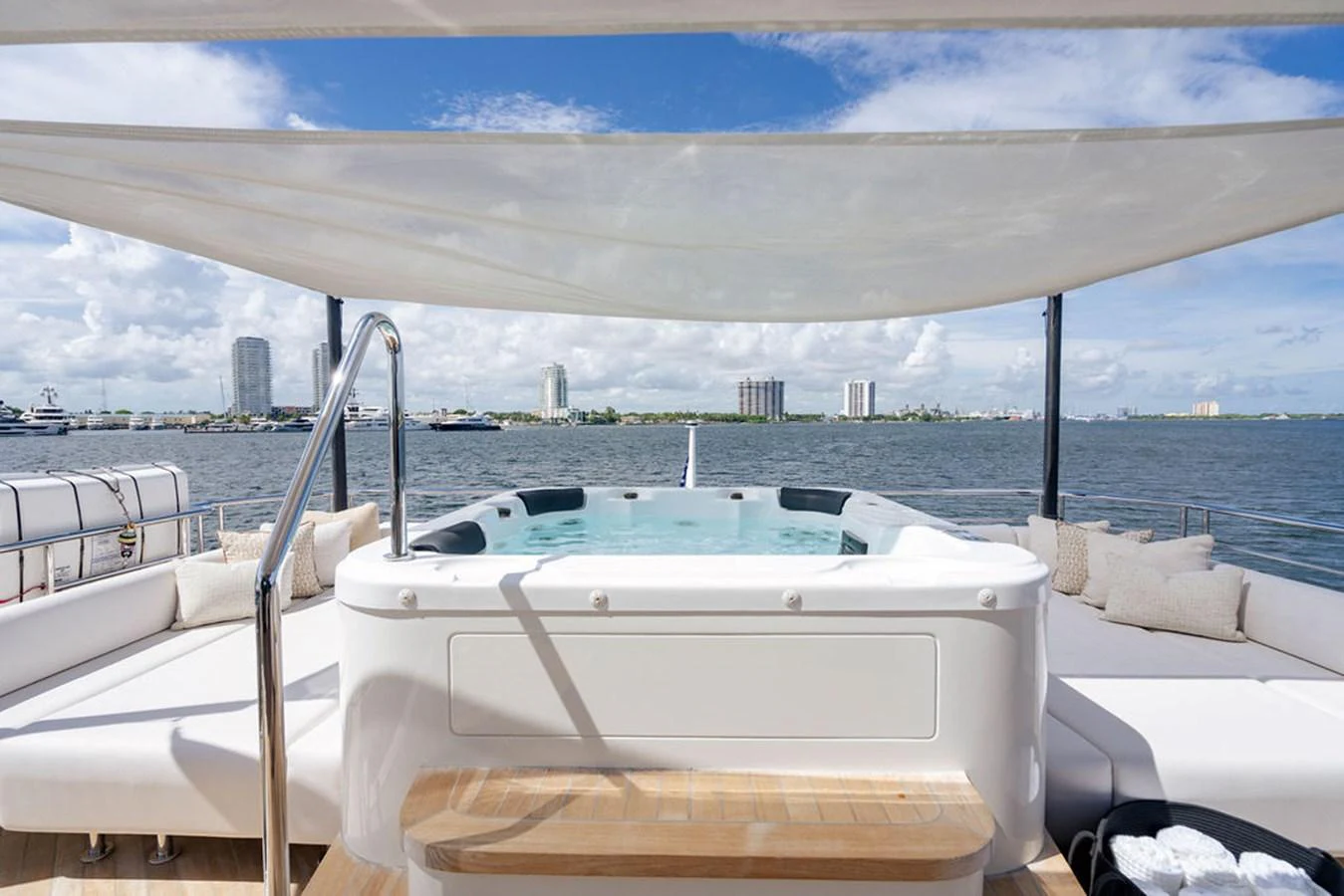 The sundeck features a luxurious jacuzzi with panoramic views of the surrounding waters. aboard M/Y 12 Yacht for Sale