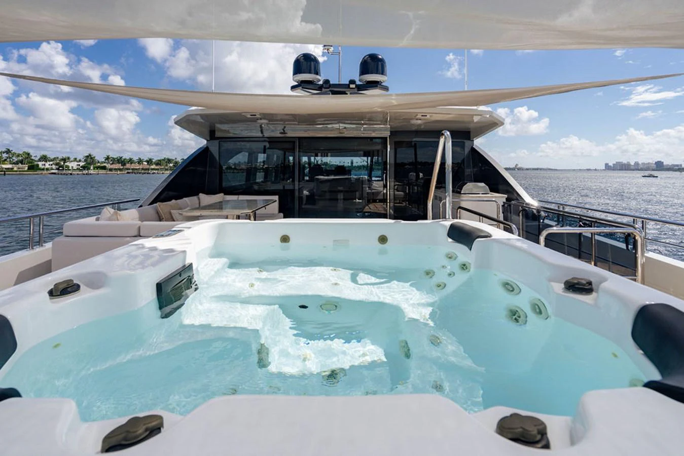 The yacht features a luxurious jacuzzi on the deck with stunning views of the surrounding waters. aboard M/Y 12 Yacht for Sale