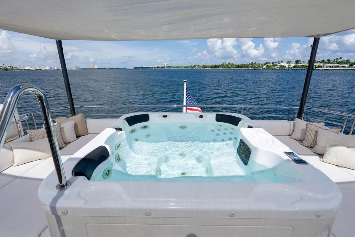 The yacht features a luxurious jacuzzi on the deck, offering stunning views of the water. aboard M/Y 12 Yacht for Sale
