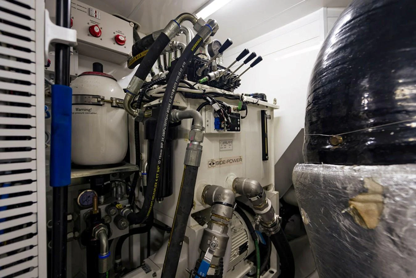 The image showcases the intricate machinery and equipment within the yacht's engine room. aboard M/Y 12 Yacht for Sale