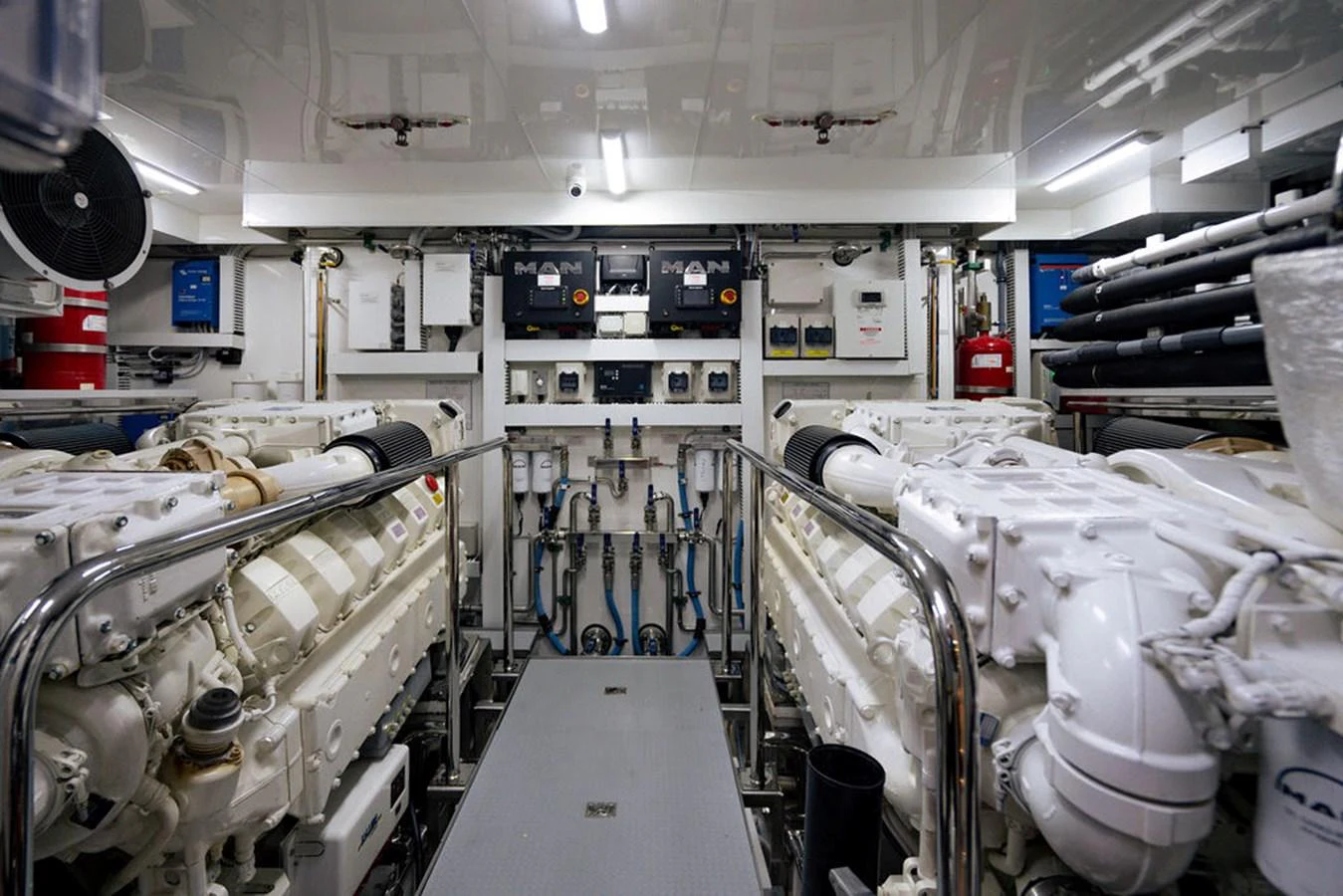 The engine room showcases powerful machinery and meticulous organization. aboard M/Y 12 Yacht for Sale
