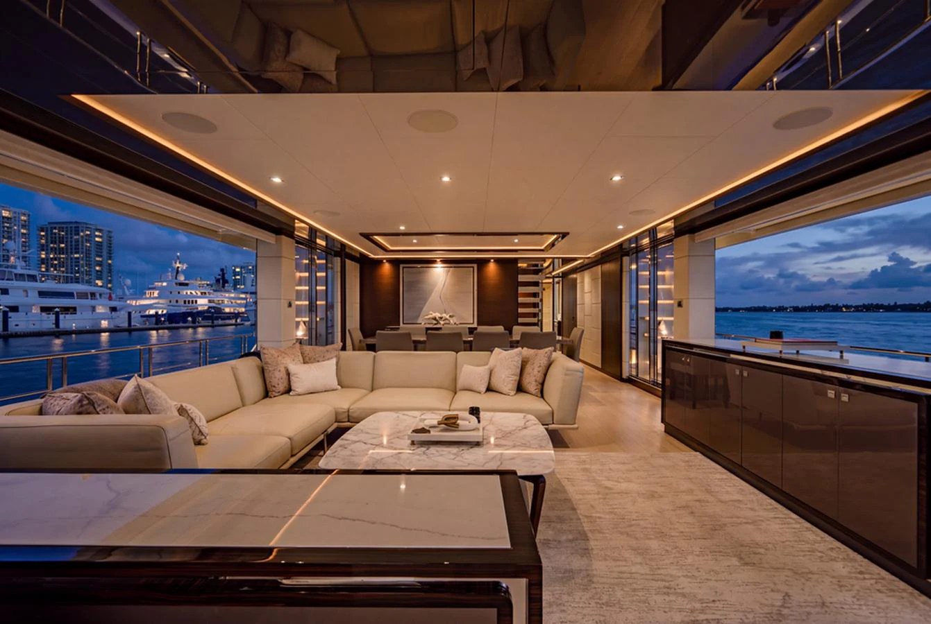 The luxurious salon offers a spacious and elegant setting with panoramic views of the water. aboard M/Y 12 Yacht for Sale