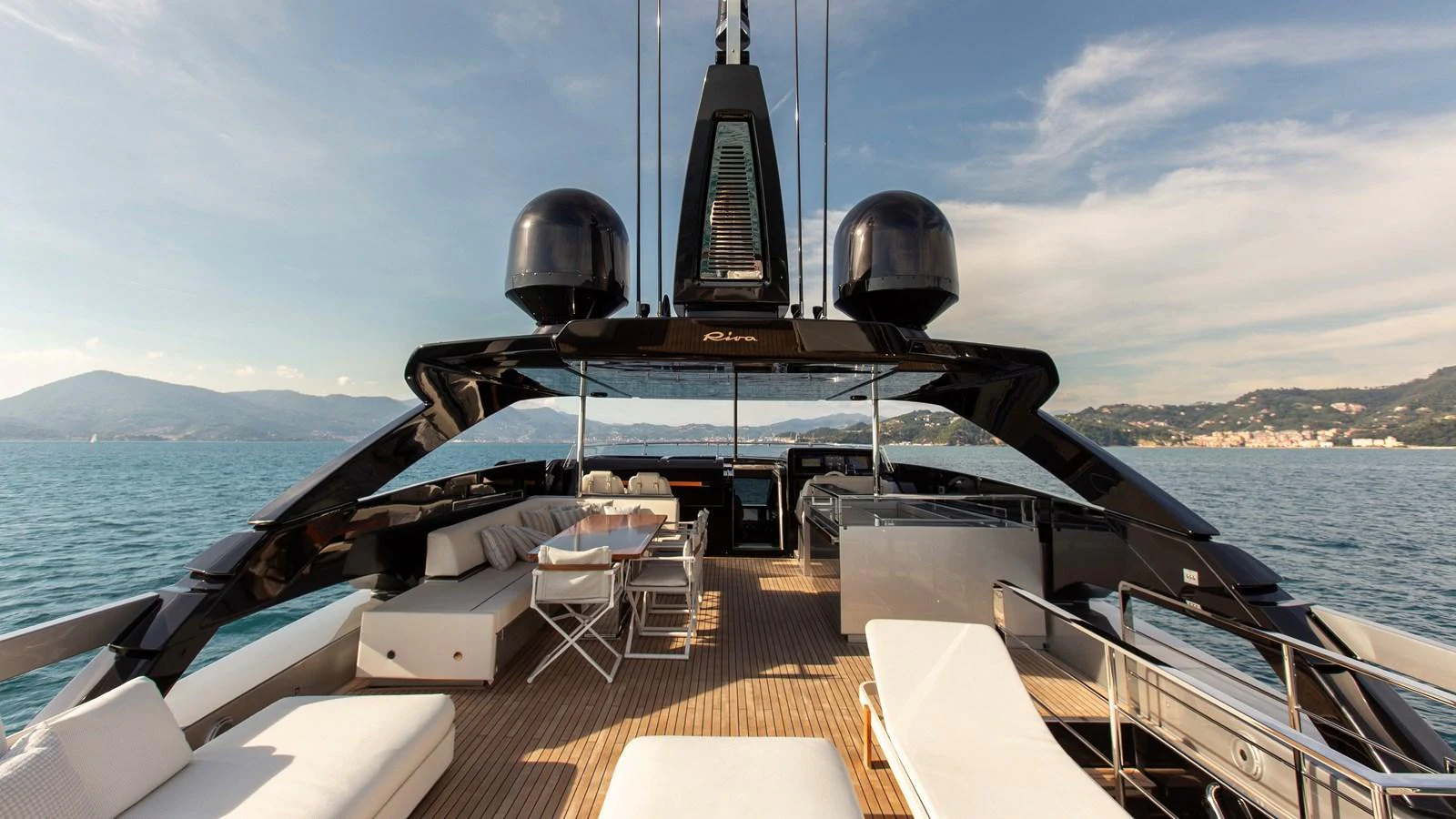 The aft deck offers a luxurious outdoor lounging and dining area with stunning sea views. aboard GIO4 Yacht for Sale