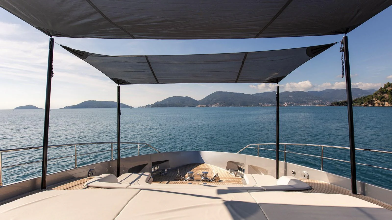 The sundeck offers a serene space with shaded lounging areas and stunning sea views. aboard GIO4 Yacht for Sale