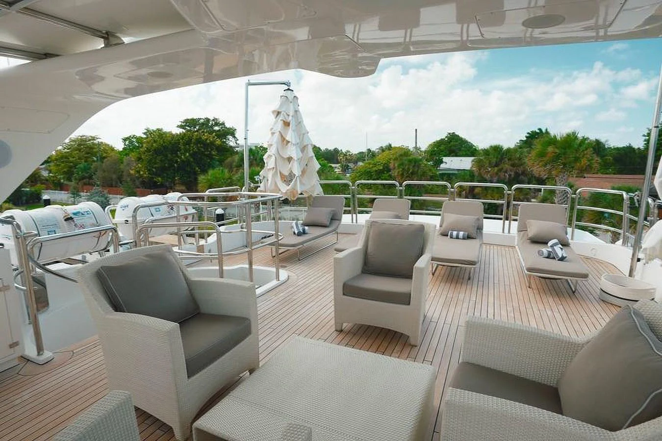 The sundeck offers a spacious and comfortable area with ample seating and scenic views. aboard GOTTA GO Yacht for Sale