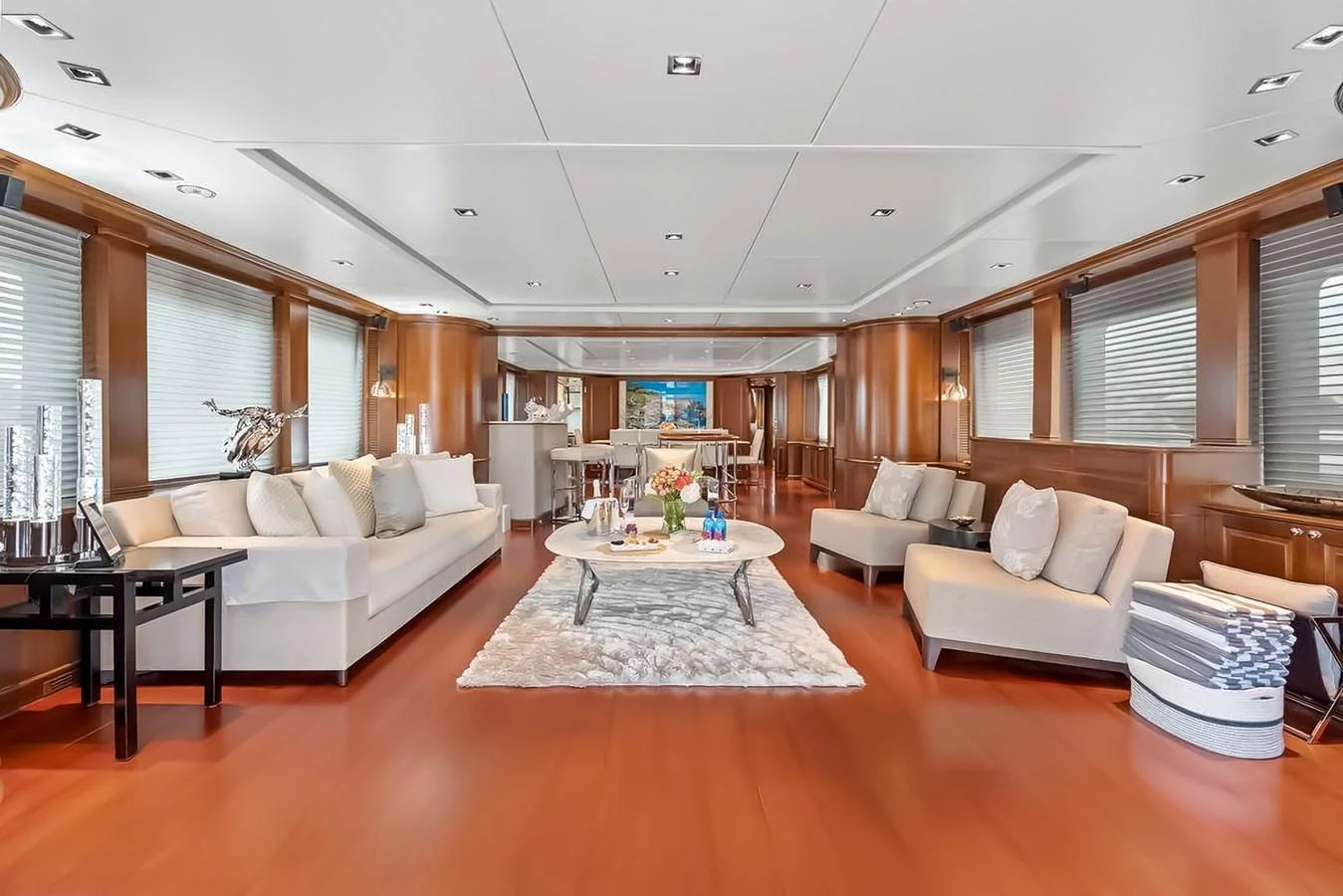 The salon features elegant furnishings and ample natural light, creating a luxurious and inviting atmosphere. aboard GOTTA GO Yacht for Sale