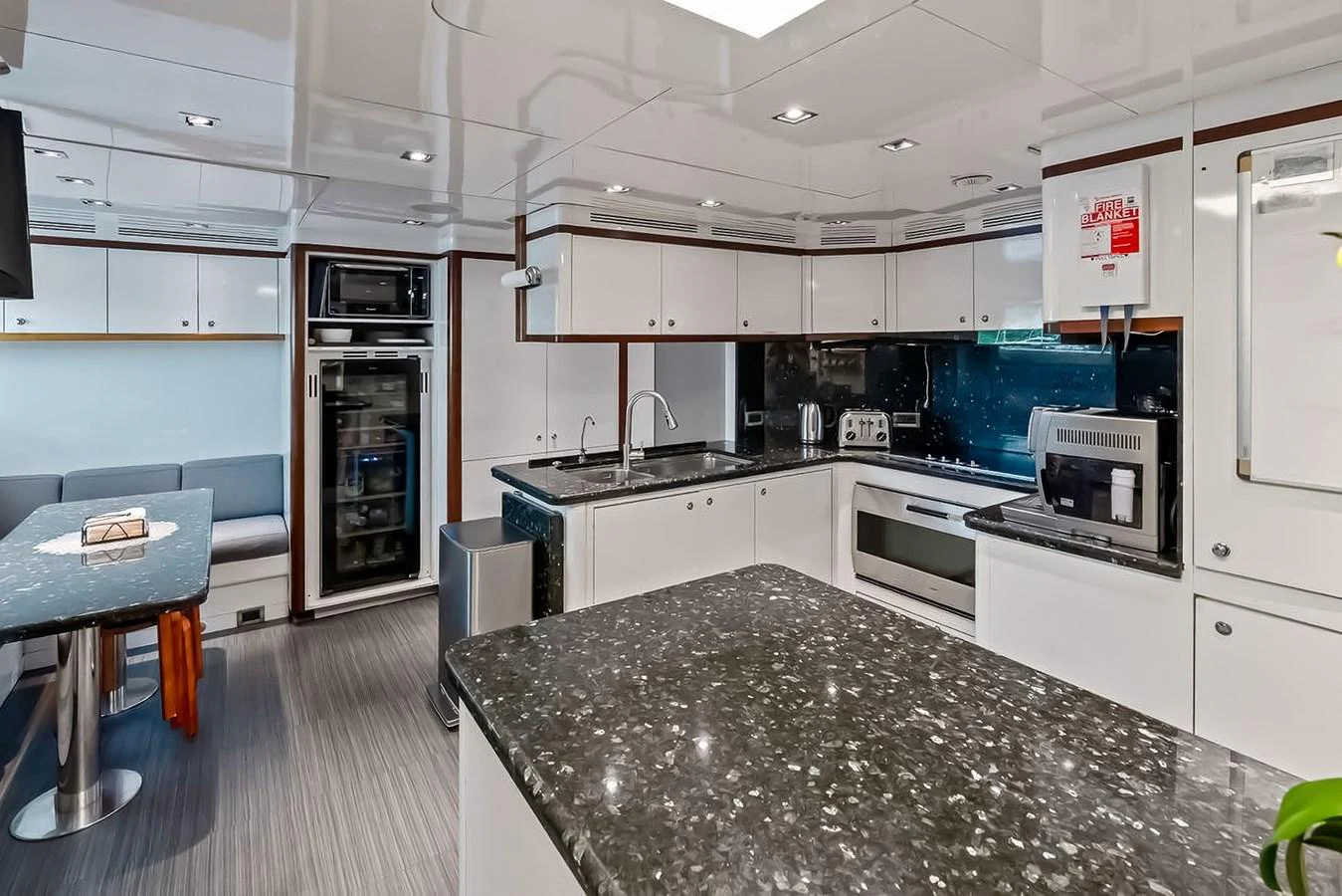 The yacht's galley is equipped with modern appliances and ample counter space, perfect for gourmet meal preparation. aboard GOTTA GO Yacht for Sale