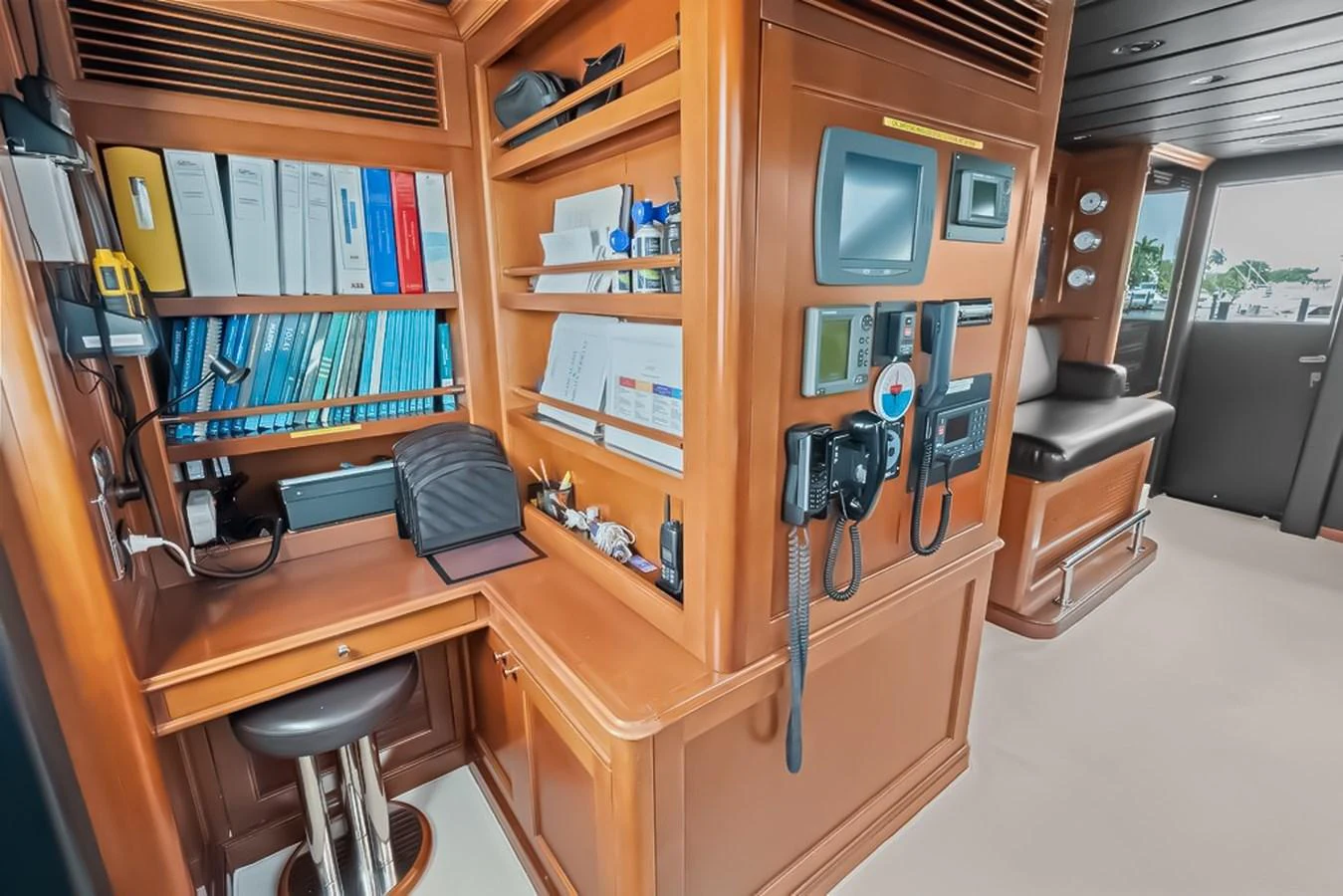 The yacht features a well-equipped office space with ample storage and modern communication equipment. aboard GOTTA GO Yacht for Sale