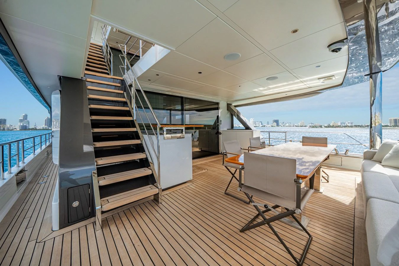 The aft deck offers a spacious and stylish area for relaxation and dining with stunning views of the water. aboard OCEAN ALEXANDER 35P05 Yacht for Sale