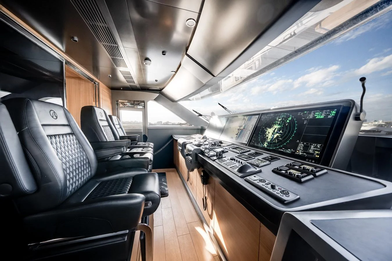 The helm station features state-of-the-art navigation equipment and luxurious seating. aboard OCEAN ALEXANDER 35P05 Yacht for Sale