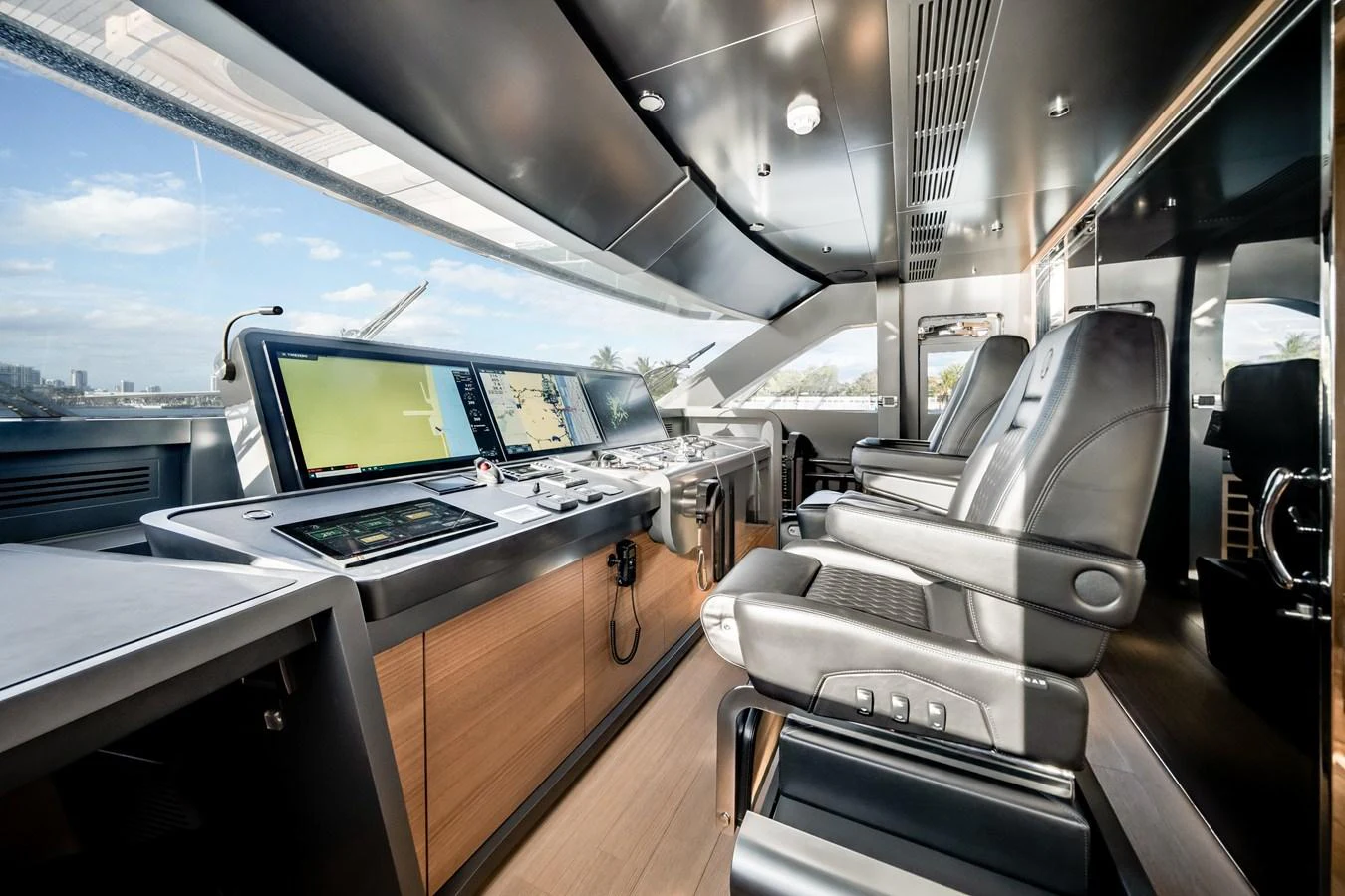 The helm station features state-of-the-art navigation equipment and luxurious seating. aboard OCEAN ALEXANDER 35P05 Yacht for Sale