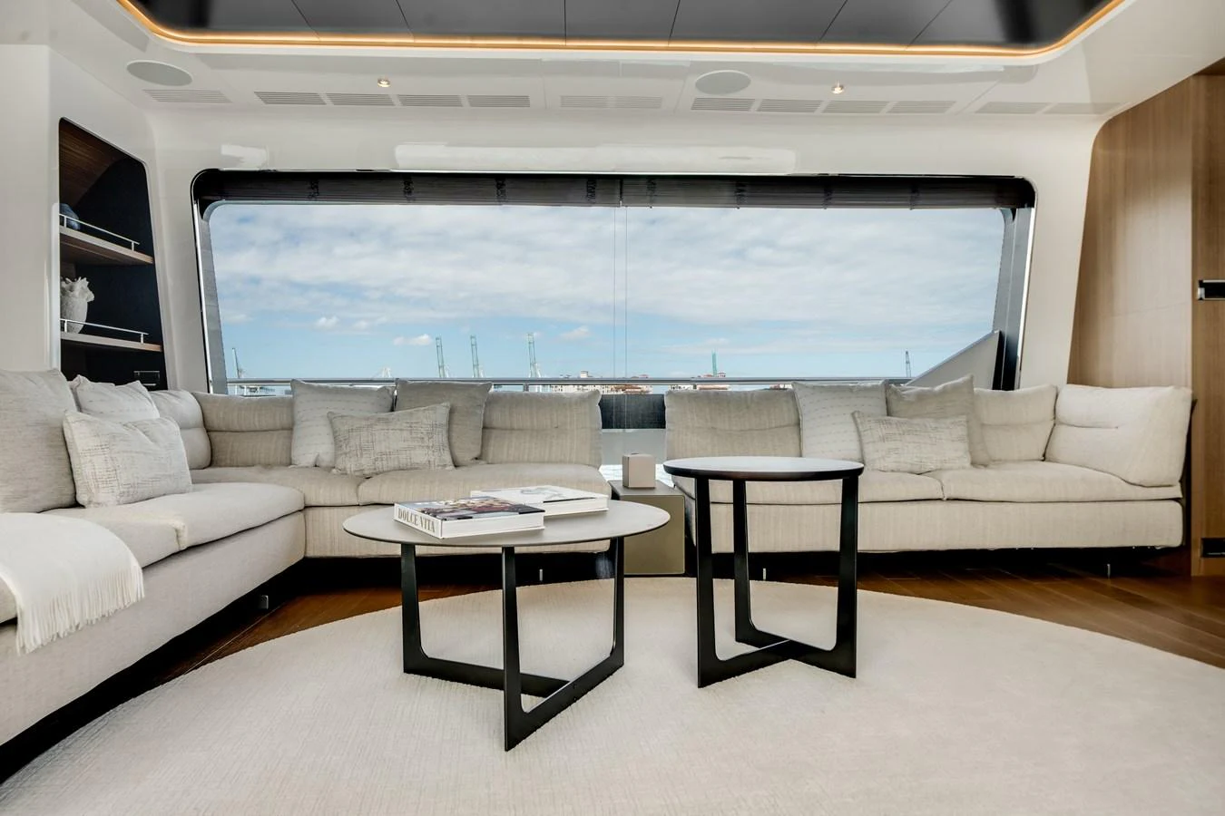 The salon features a spacious and elegant seating area with large windows offering stunning views. aboard OCEAN ALEXANDER 35P05 Yacht for Sale