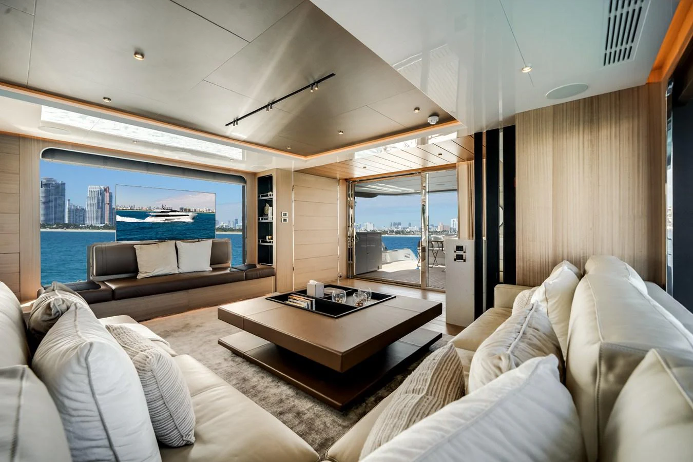 The luxurious salon offers expansive views and elegant seating arrangements. aboard OCEAN ALEXANDER 35P05 Yacht for Sale
