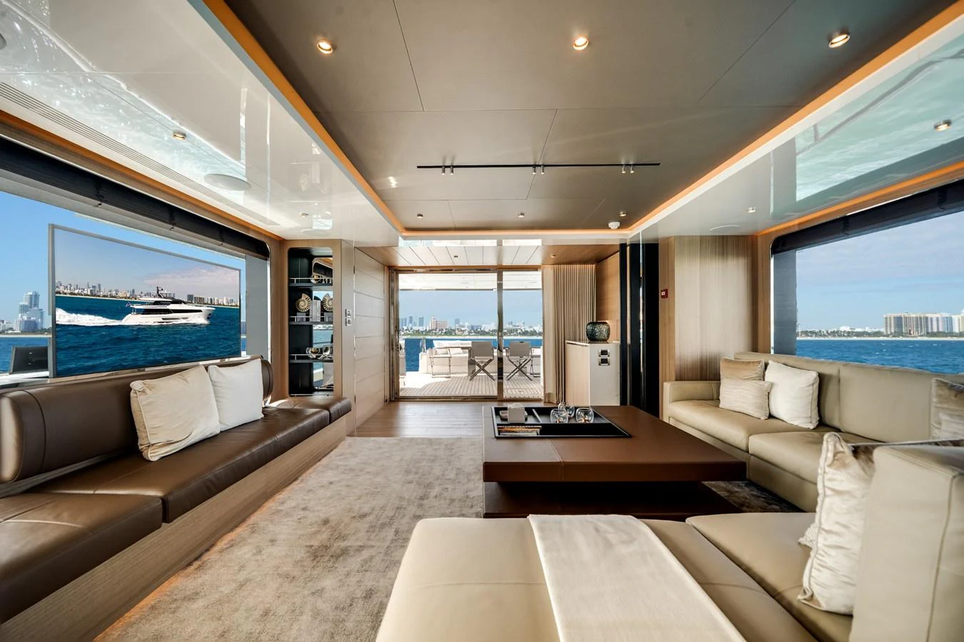 The salon offers a spacious and luxurious seating area with panoramic views of the water. aboard OCEAN ALEXANDER 35P05 Yacht for Sale