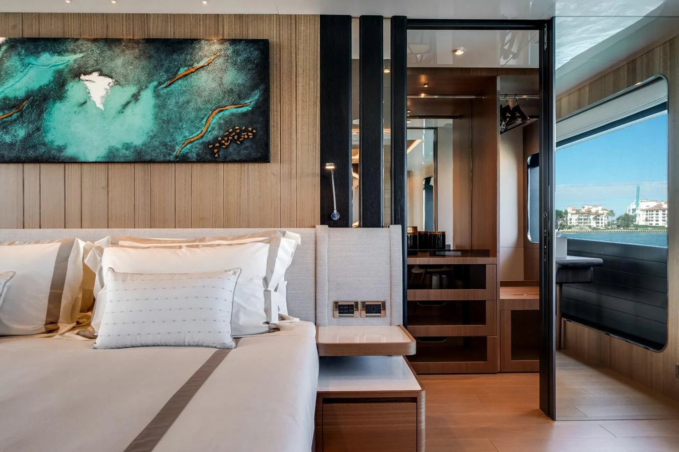 The master stateroom features luxurious bedding, modern decor, and ample natural light. aboard OCEAN ALEXANDER 35P05 Yacht for Sale