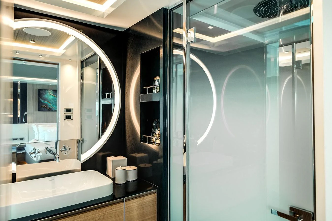 The yacht's bathroom features modern fixtures and elegant lighting. aboard OCEAN ALEXANDER 35P05 Yacht for Sale