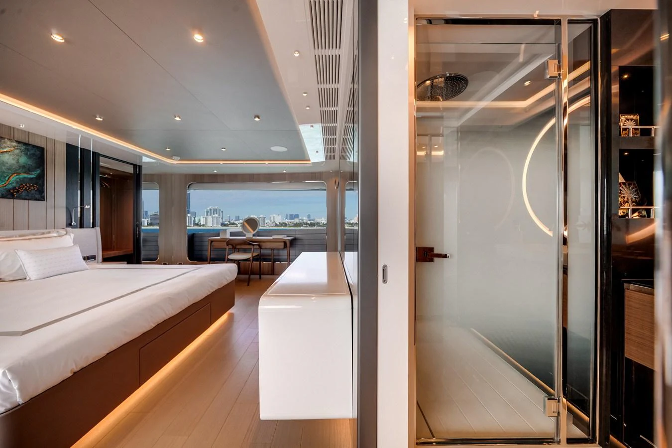 The master stateroom features a spacious layout with modern decor and a luxurious ensuite bathroom. aboard OCEAN ALEXANDER 35P05 Yacht for Sale