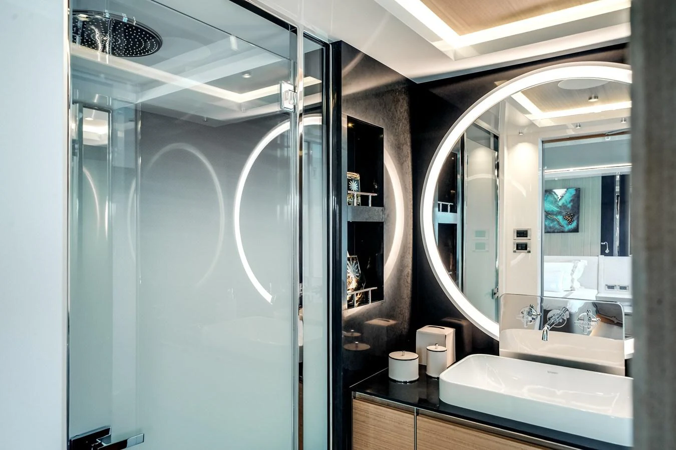 A modern yacht bathroom featuring sleek fixtures and ambient lighting. aboard OCEAN ALEXANDER 35P05 Yacht for Sale