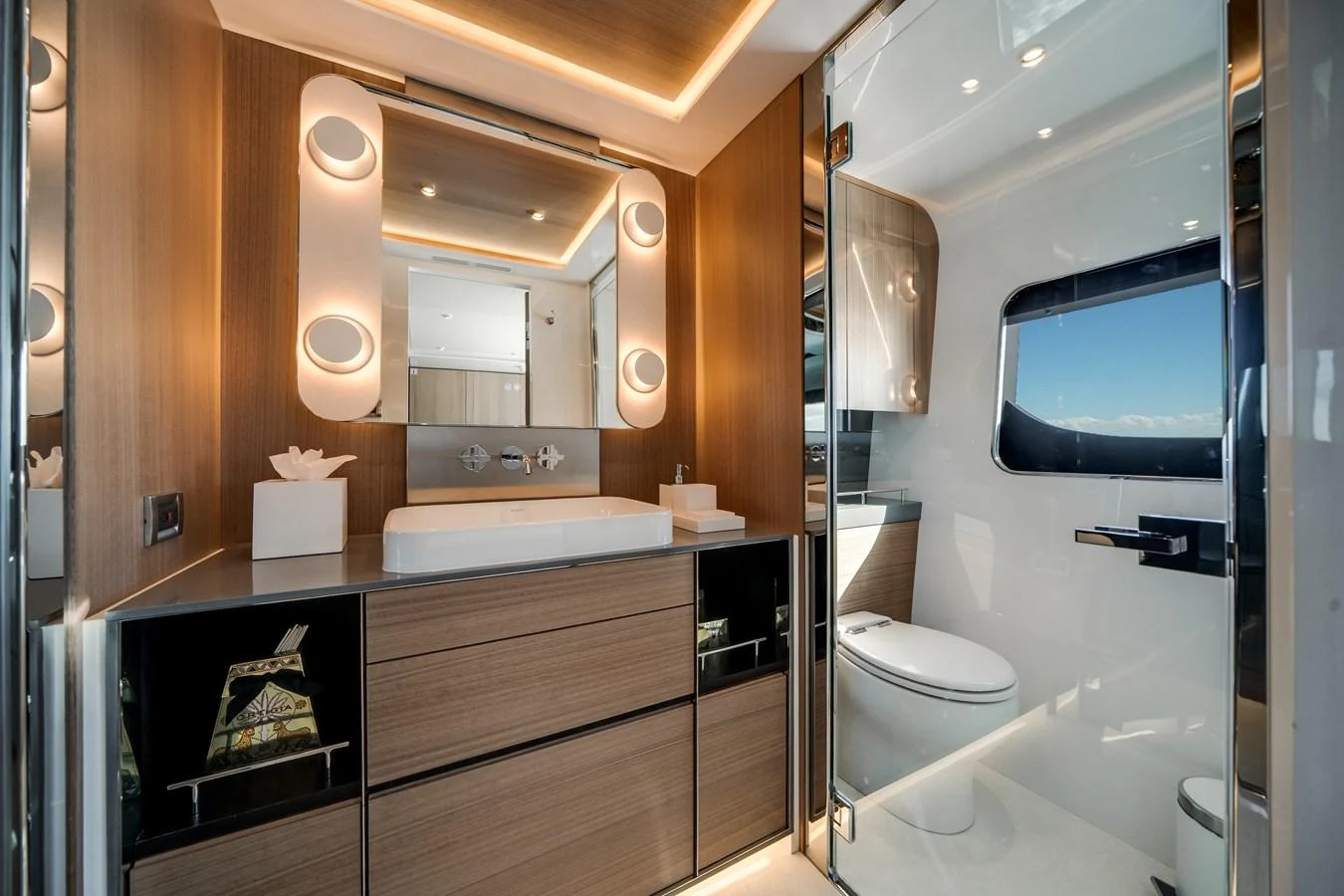 The yacht's bathroom features modern fixtures and elegant lighting, creating a luxurious and inviting space. aboard OCEAN ALEXANDER 35P05 Yacht for Sale