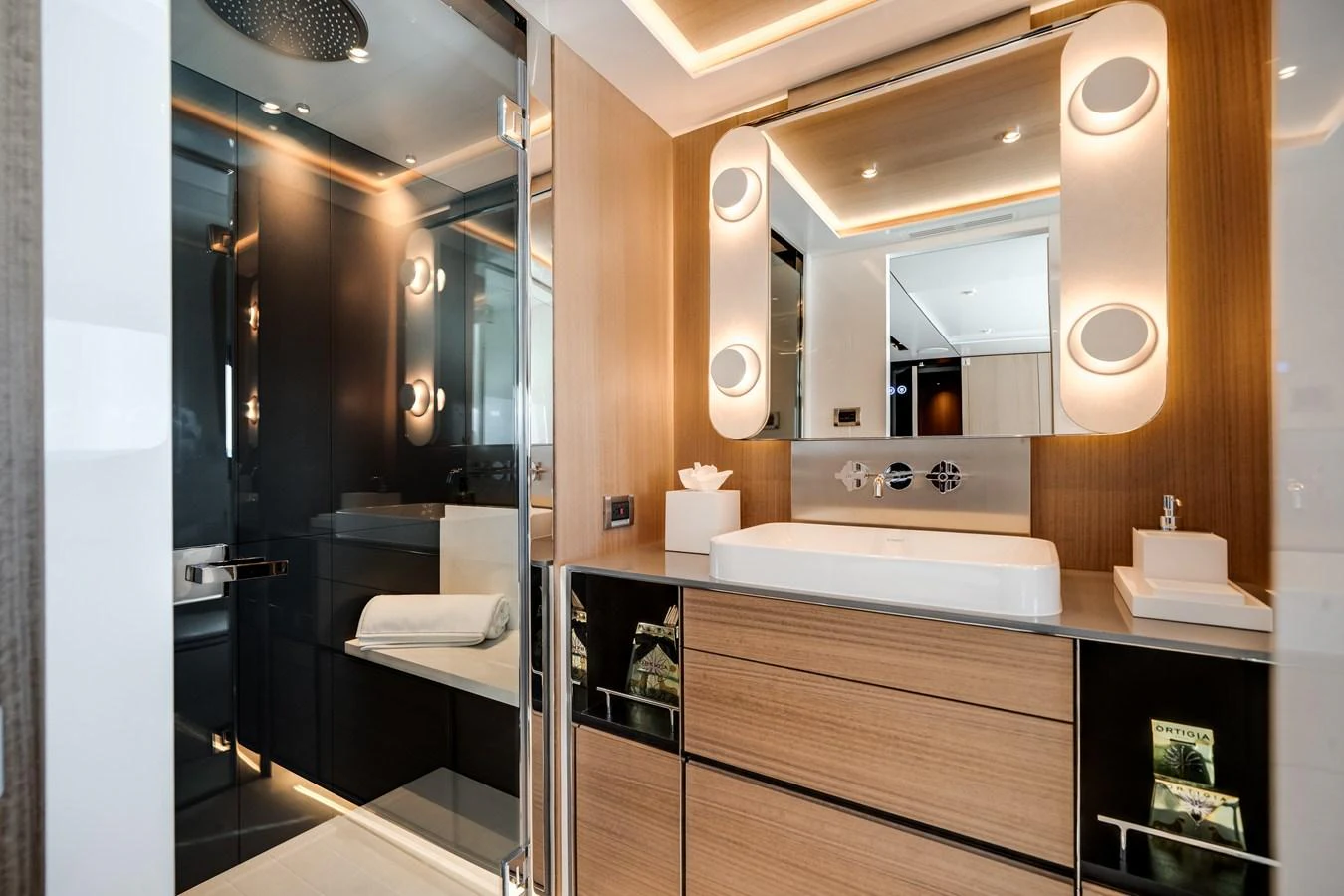 The yacht's bathroom features modern fixtures and elegant lighting. aboard OCEAN ALEXANDER 35P05 Yacht for Sale