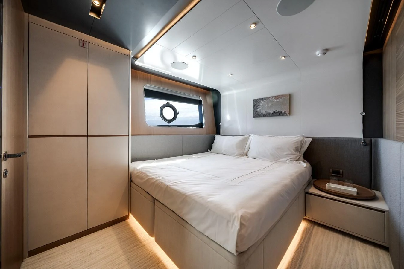 A luxurious stateroom featuring a comfortable double bed and modern design elements. aboard OCEAN ALEXANDER 35P05 Yacht for Sale