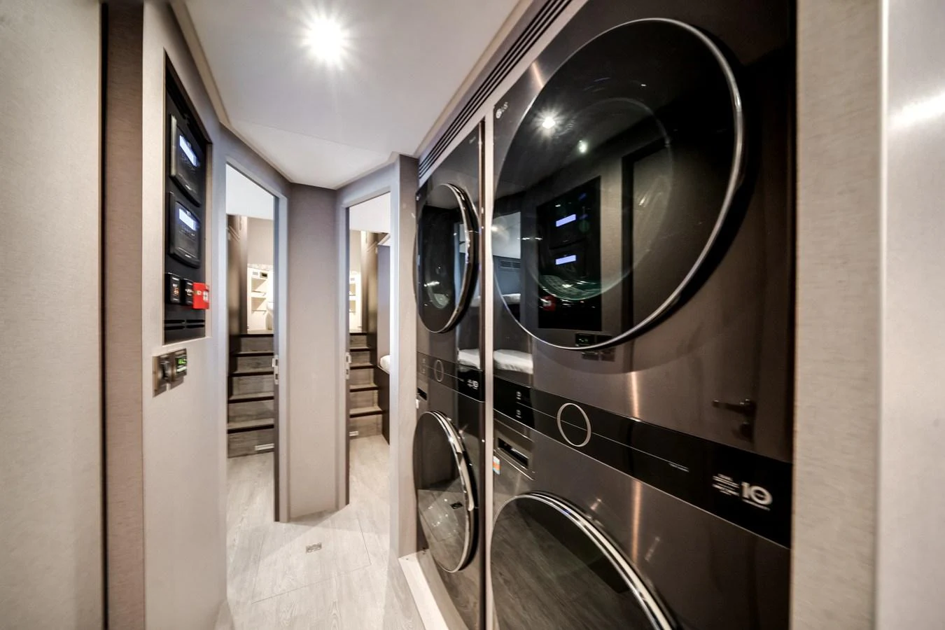 The yacht features a modern laundry room equipped with state-of-the-art appliances. aboard OCEAN ALEXANDER 35P05 Yacht for Sale